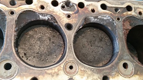 Carbon deposition on the piston heads
